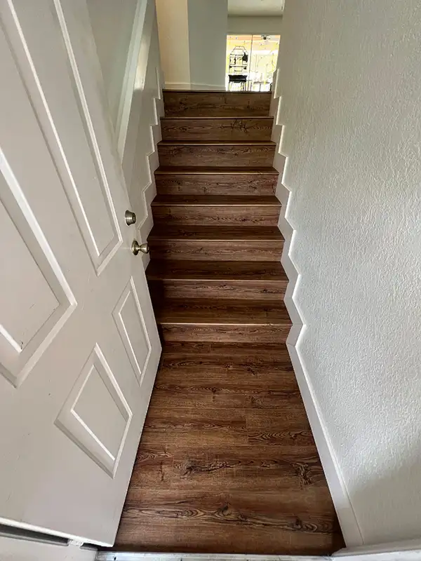 Narrow staircase with wood treads
