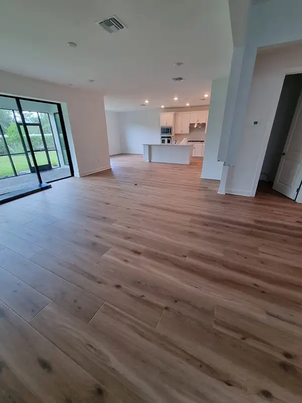 Open living room with new wood-look flooring