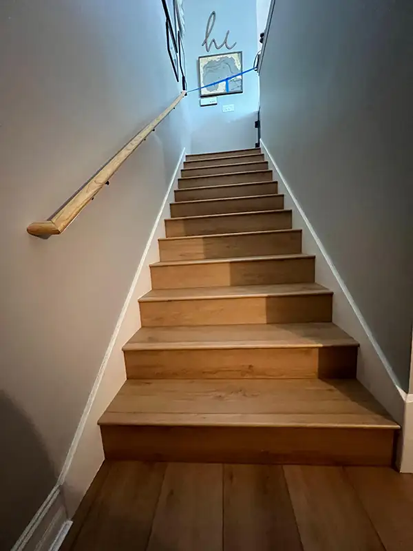 Staircase with wood treads and handrail