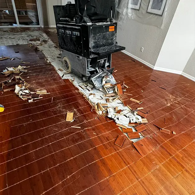 Living room before: old floor being removed